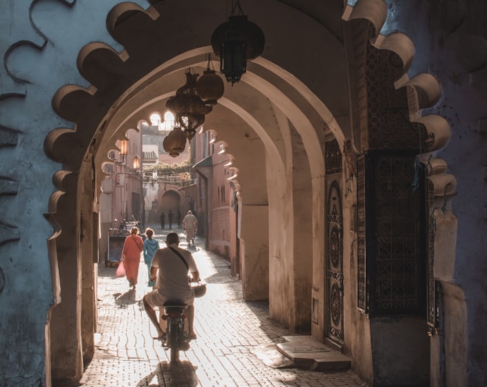 people under tunnel during daytime