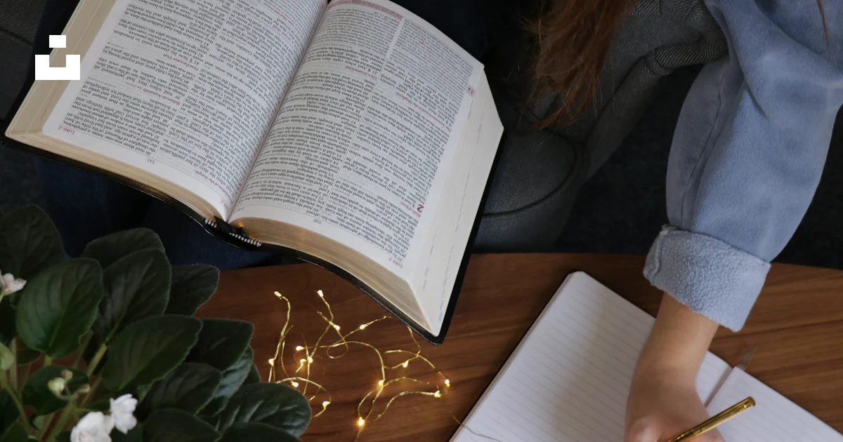 Person writing on notebook photo – Free Brown Image on Unsplash