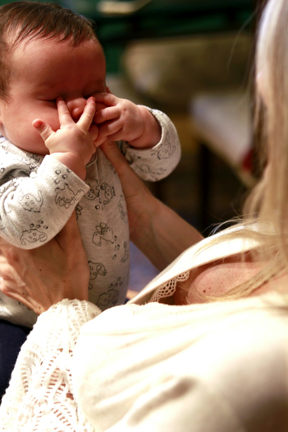 woman holding baby