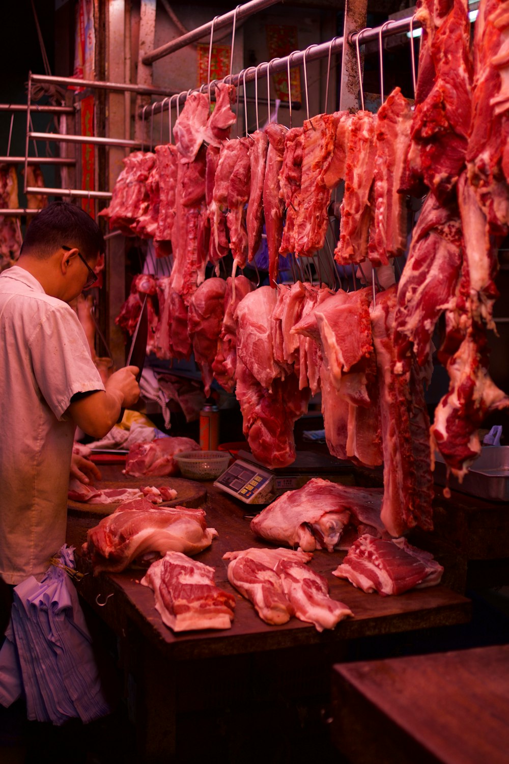 man chopping meat