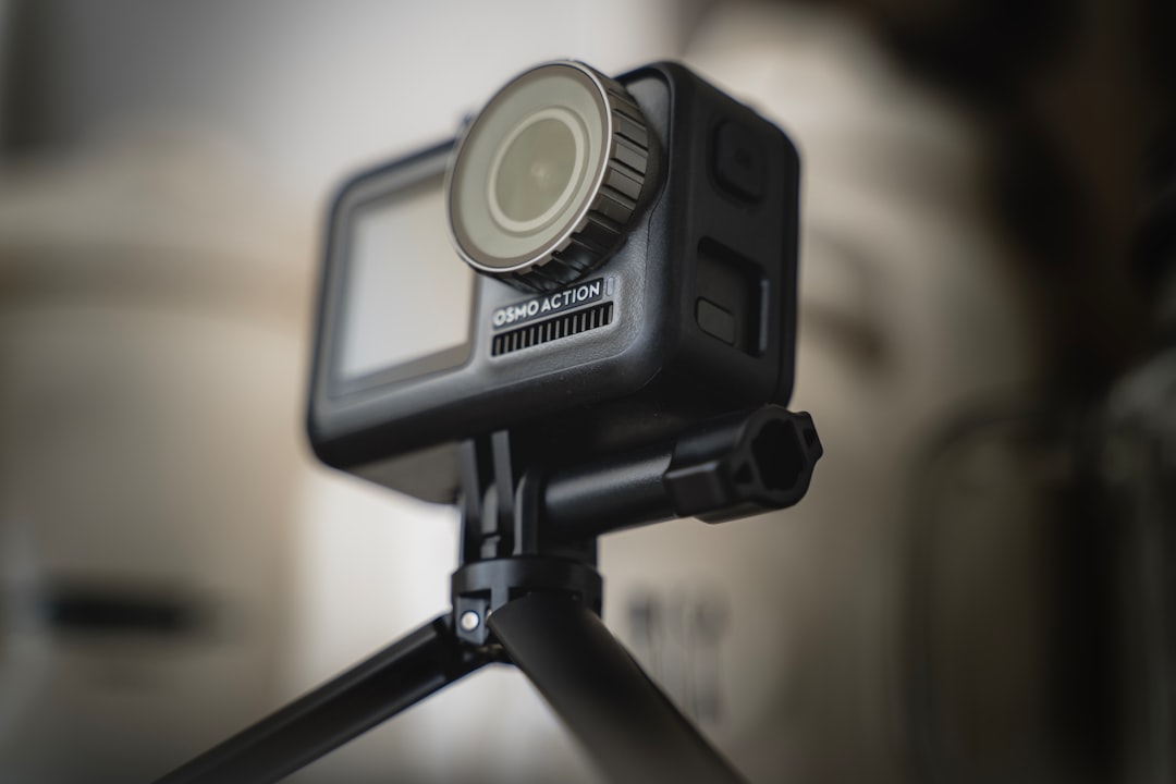 shallow focus photo of black action camera