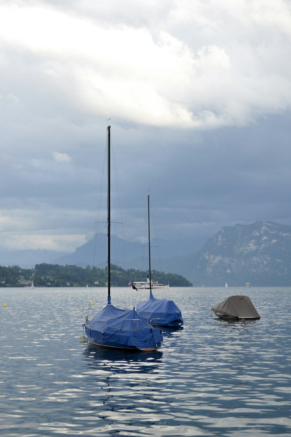 boats on ocean during daytime