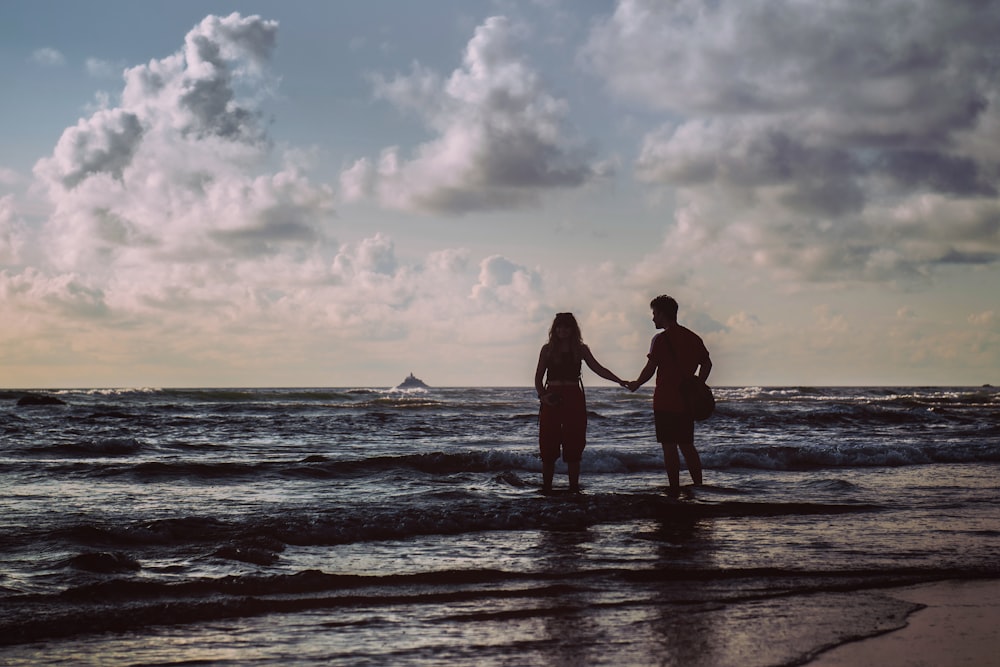 two persons on shore