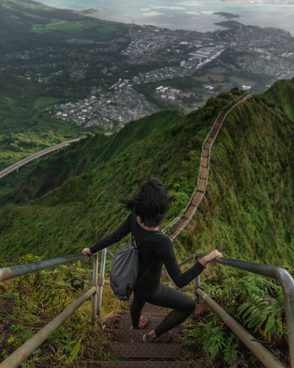 person on stairs on mountain