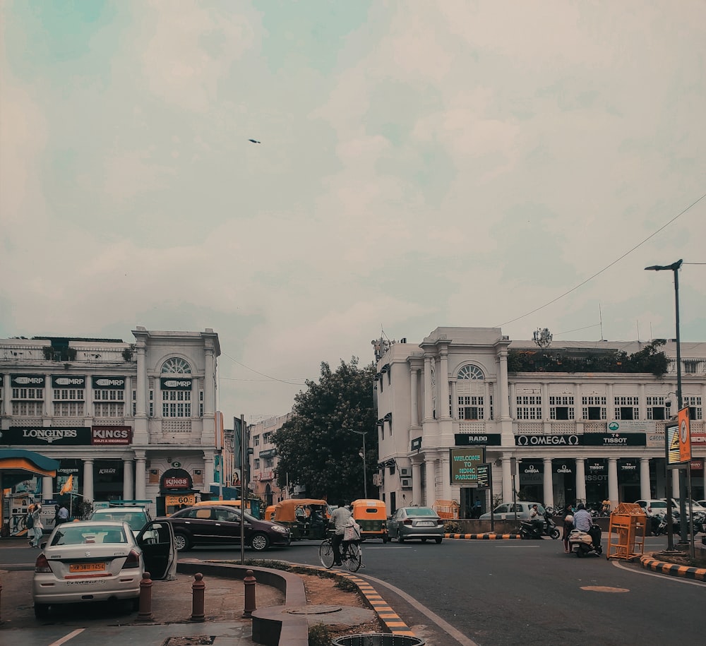 photography of vehicles traveling on road during daytime