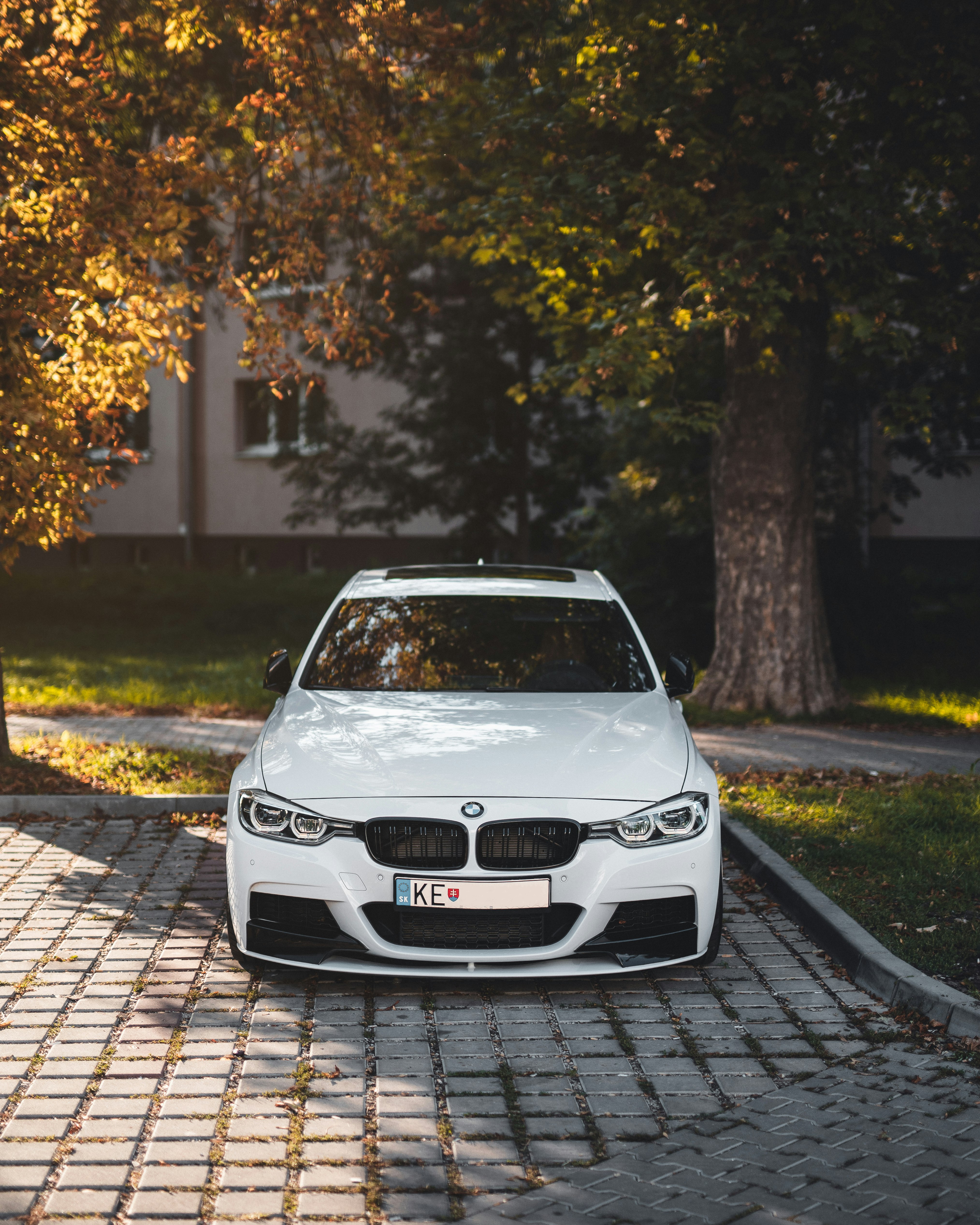 white BMW sedan