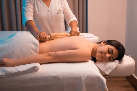 woman getting wood therapy massage