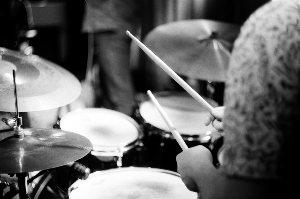 person playing drums