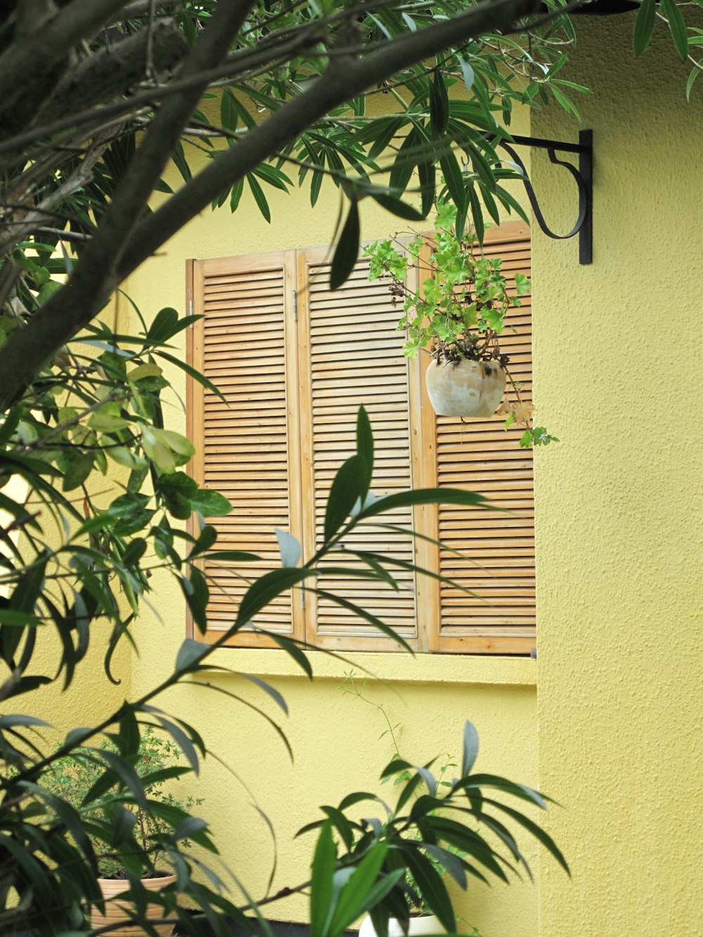 building with closed beige wooden door