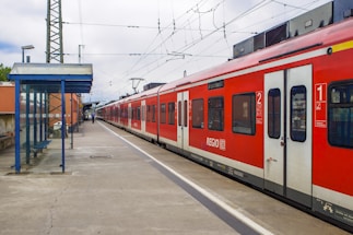 red and white train during daytime