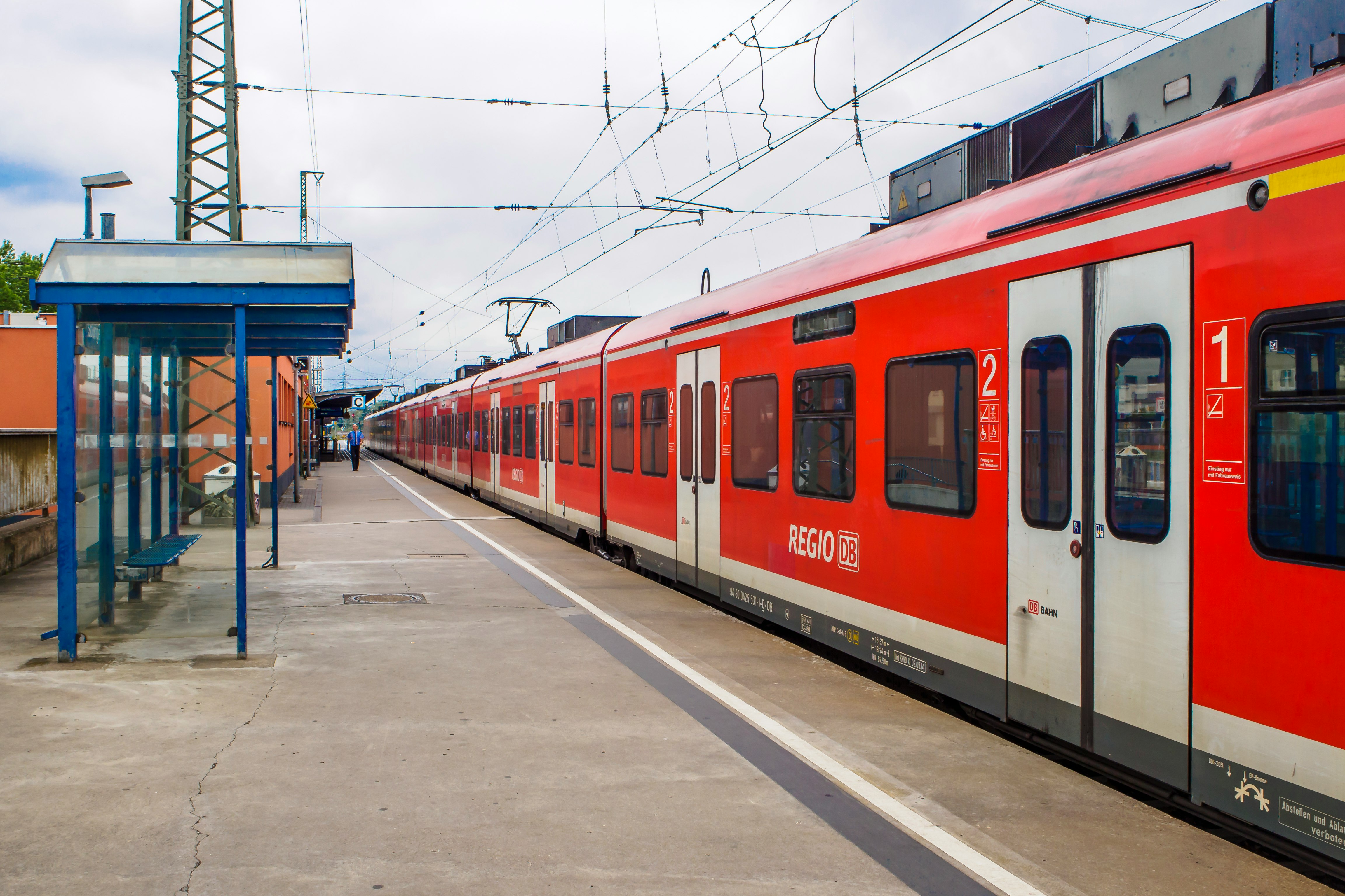 red and white train during daytime