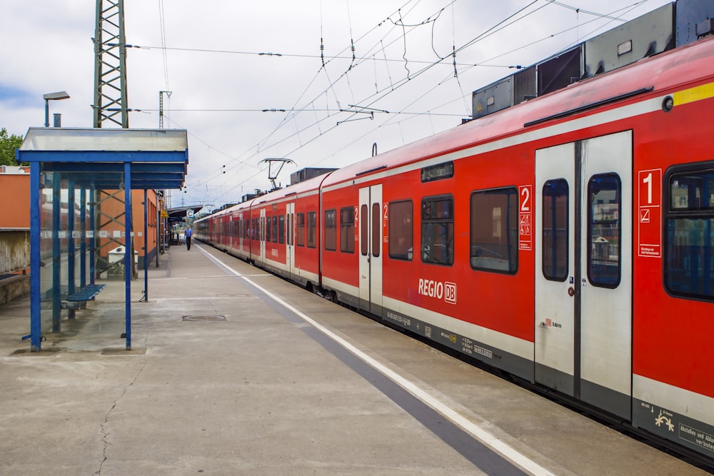 red and white train during daytime