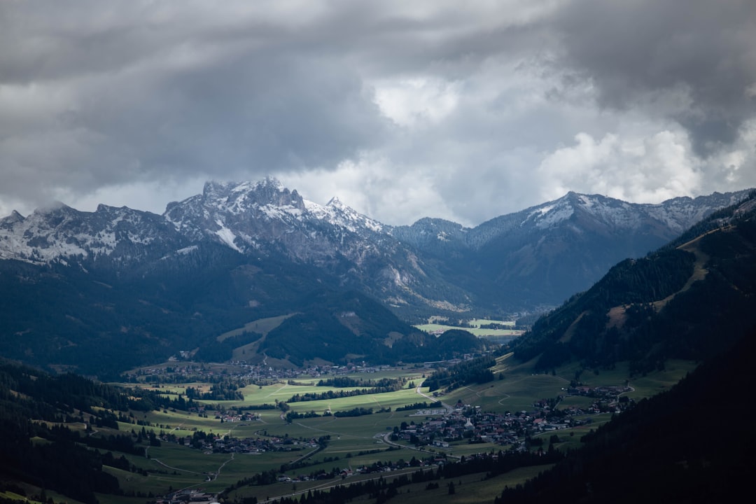 brown and white mountain photo during cloudy daytime