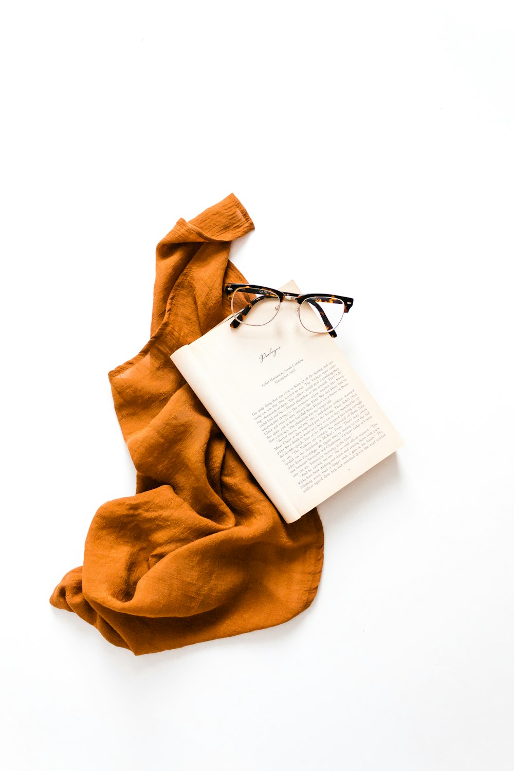 orange scarf with white card