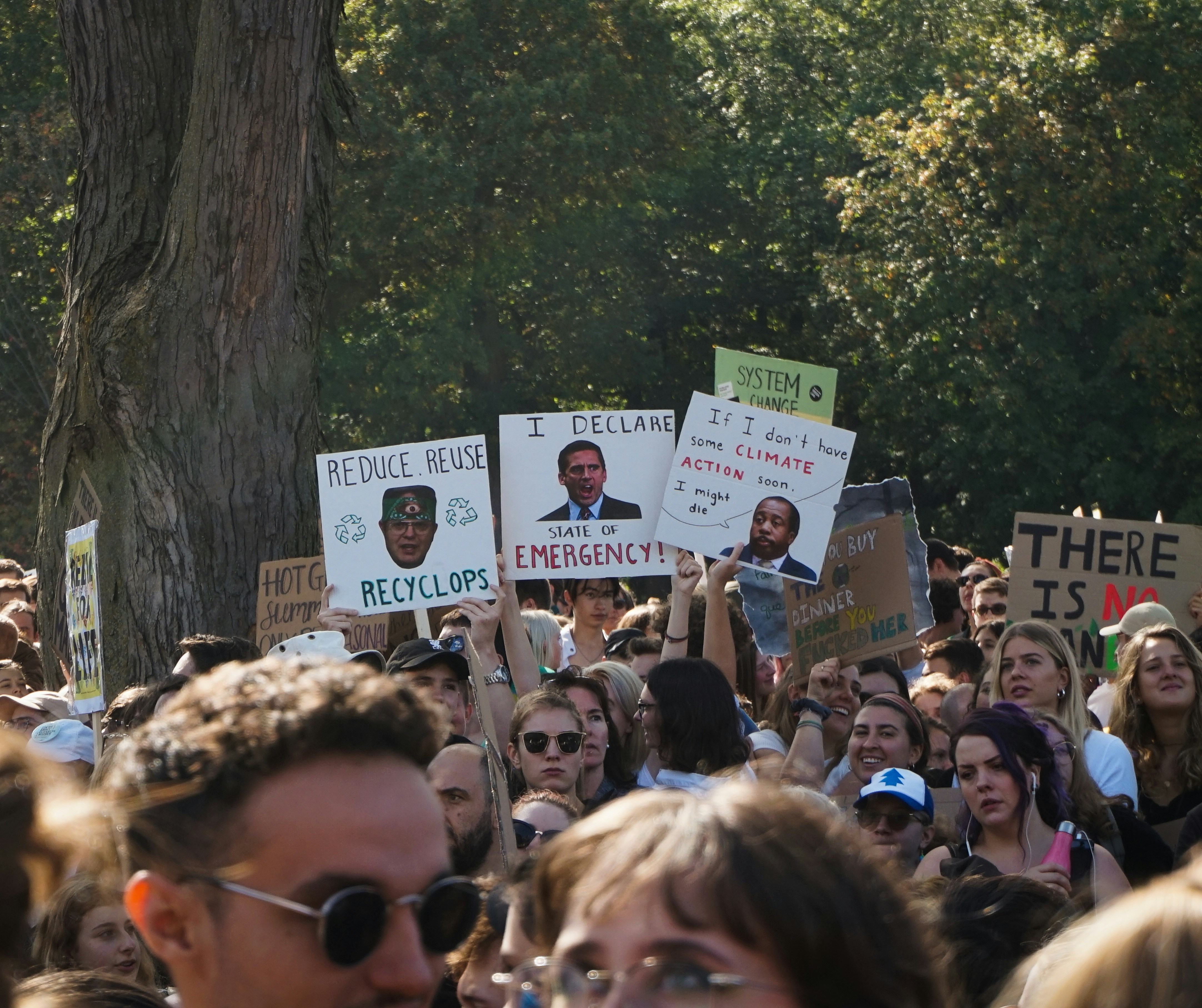 people holding streamers, Montreal Climate Strike - September 27th, 2019.