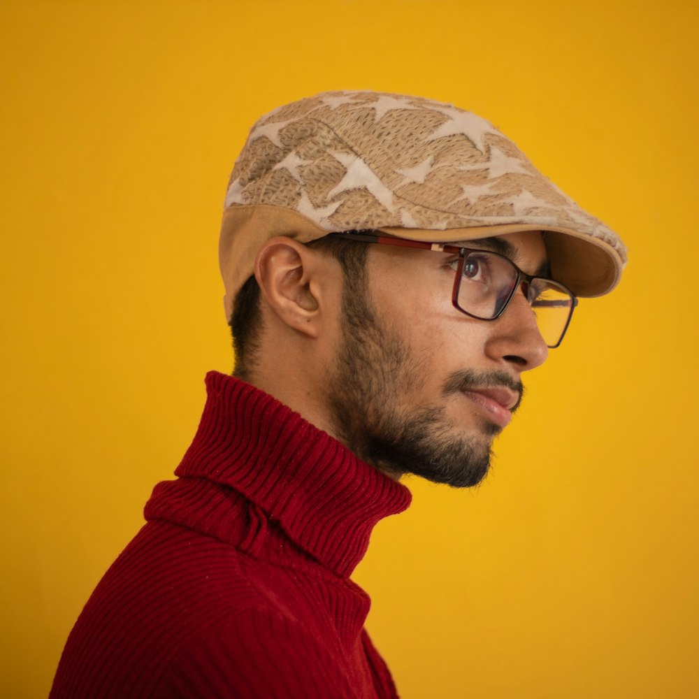 man wearing red turtleneck shirt