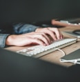 person using computer keyboard