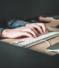 person using computer keyboard