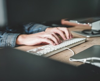 person using computer keyboard