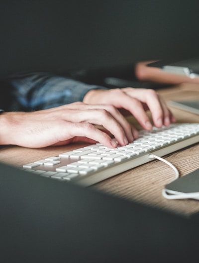 person using computer keyboard