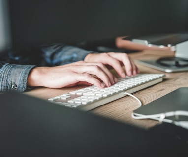 person using computer keyboard