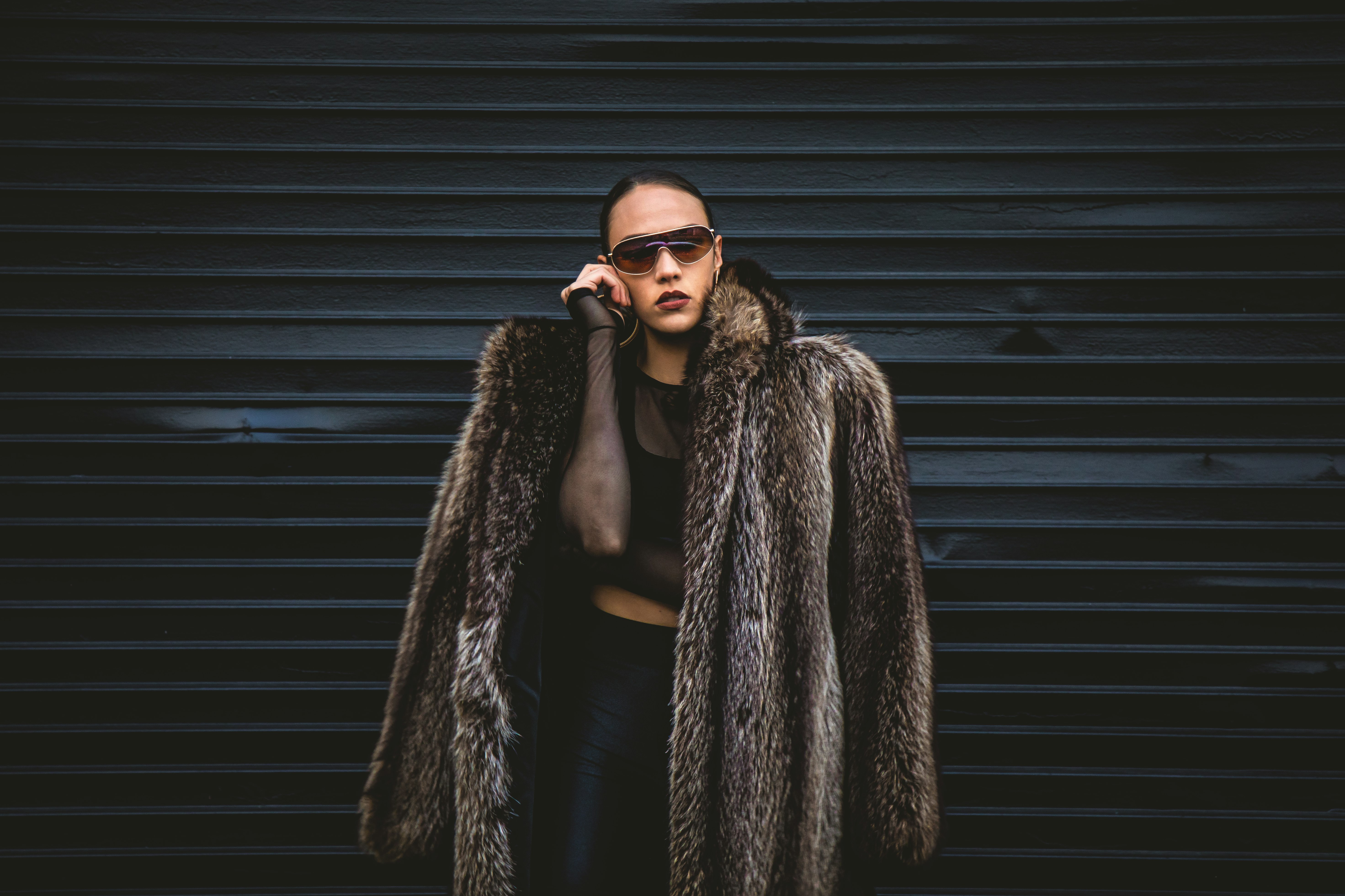 woman wearing brown fur coat