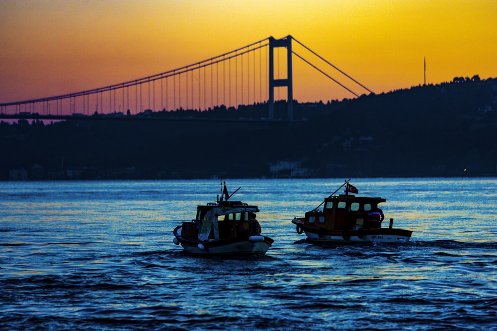 two tug boats near Golden Gate Bridge