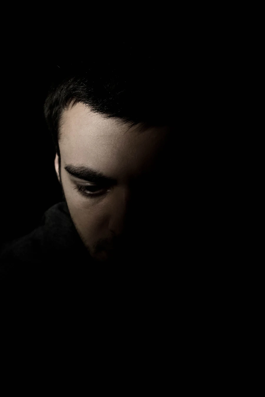 A man's profile in silhouette