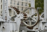 selective focus photography of machine with gears