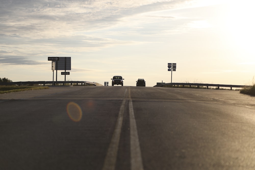 low-angle photography of car on road