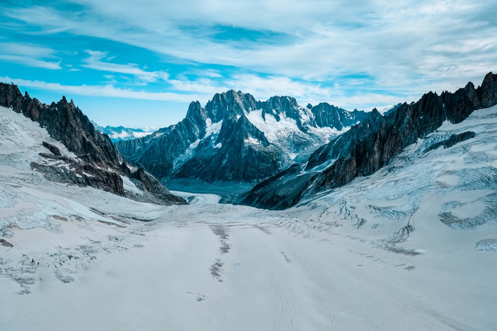 snow covered mountain during daytime