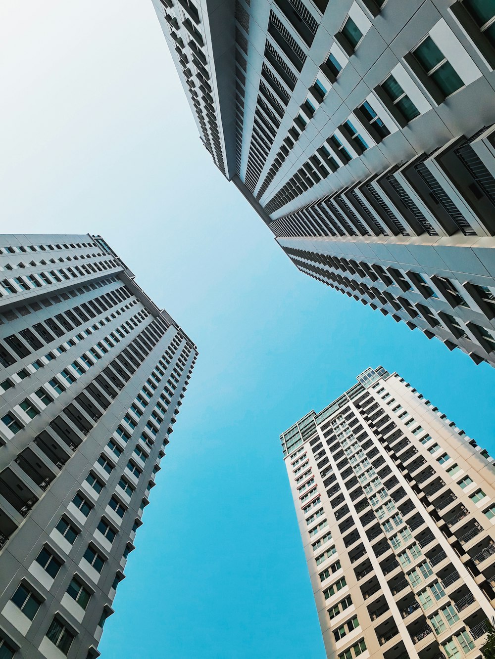 low angle photography of concrete buildings