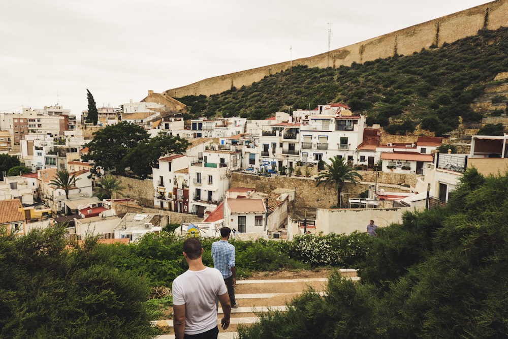 two men near buildings