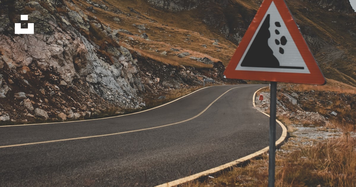 Two orange and red triangular signages photo – Free Road sign Image on ...