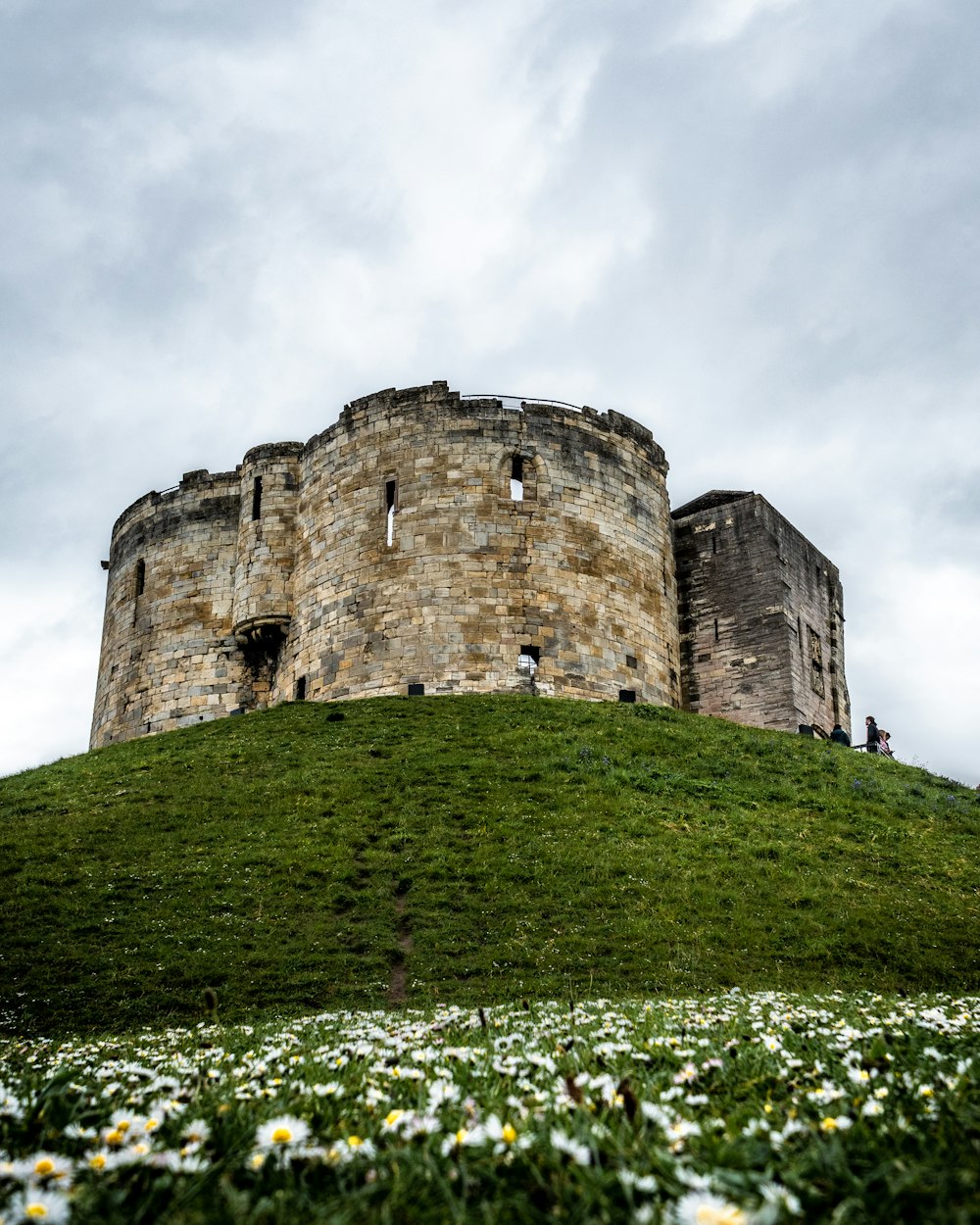 gray castle on top of hill at daytime