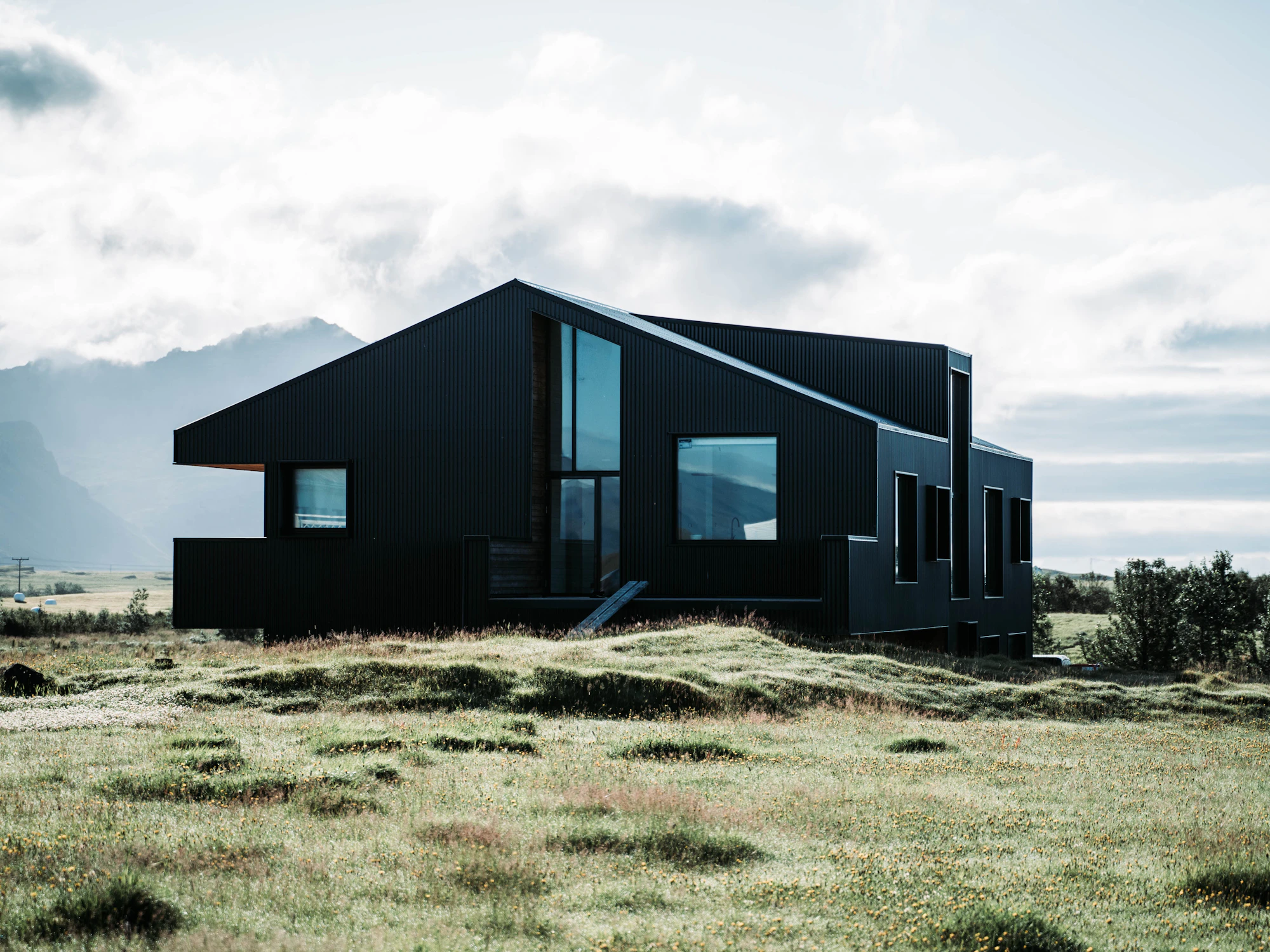 Matte black two-storey modular house