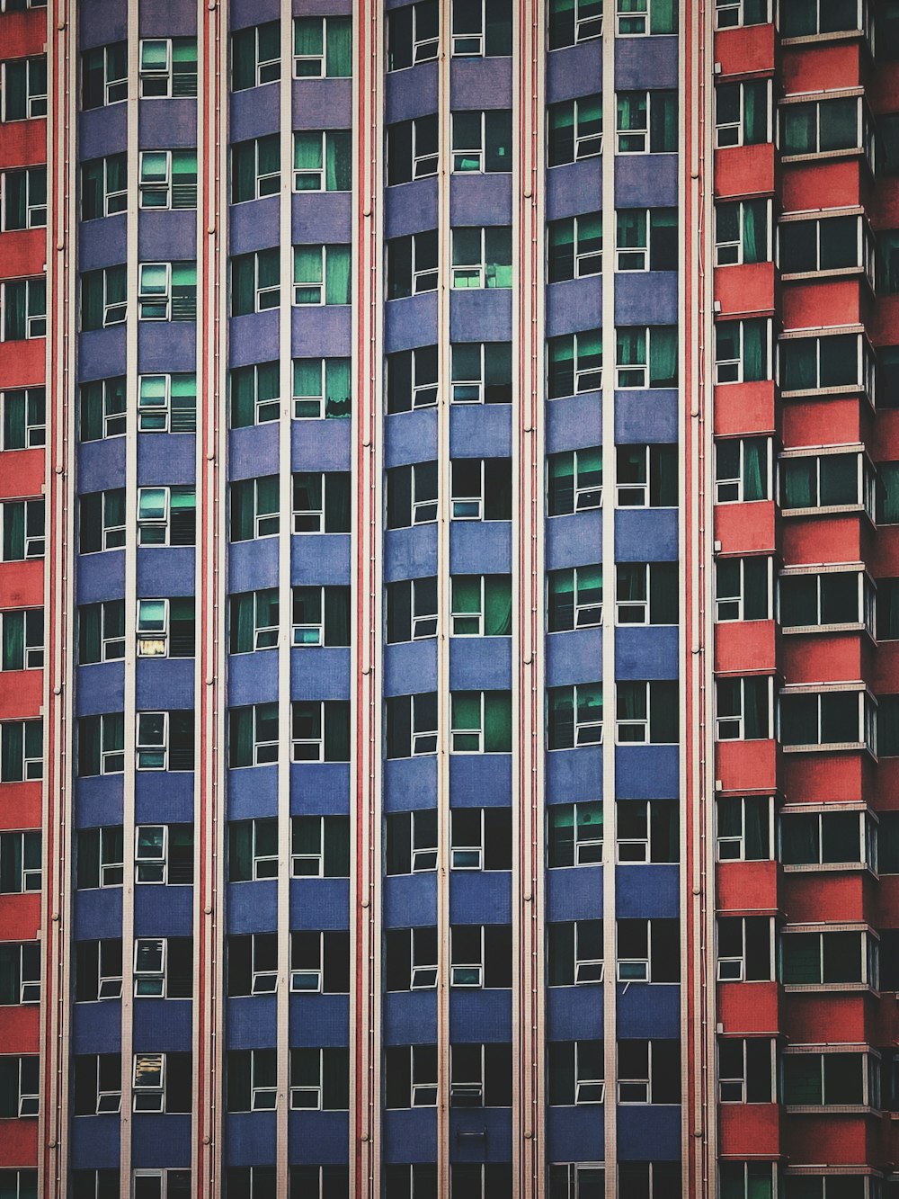 blue and red high-rise building