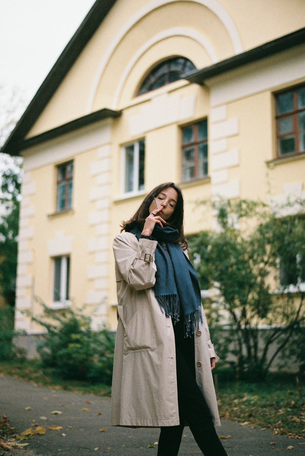 woman standing in front of building at daytime