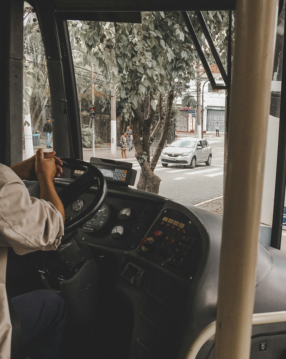 man sitting on driver seat