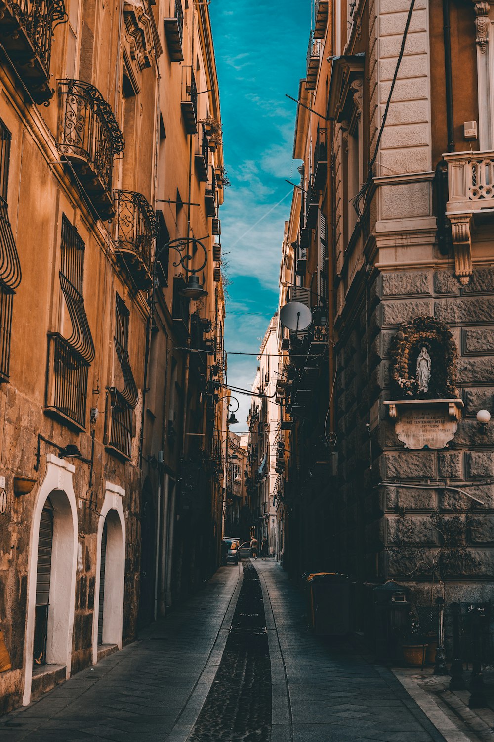 empty road between buildings