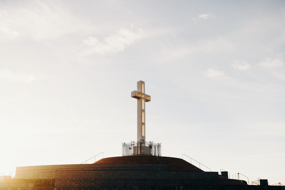 cross under white sky