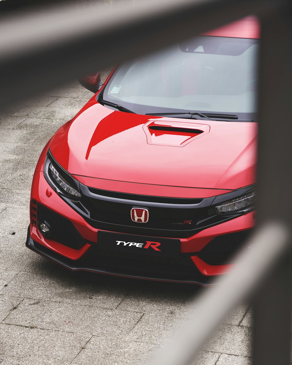 red Honda vehicle