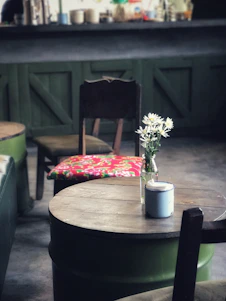 Cozy home setting with practical household items arranged neatly on a wooden table.