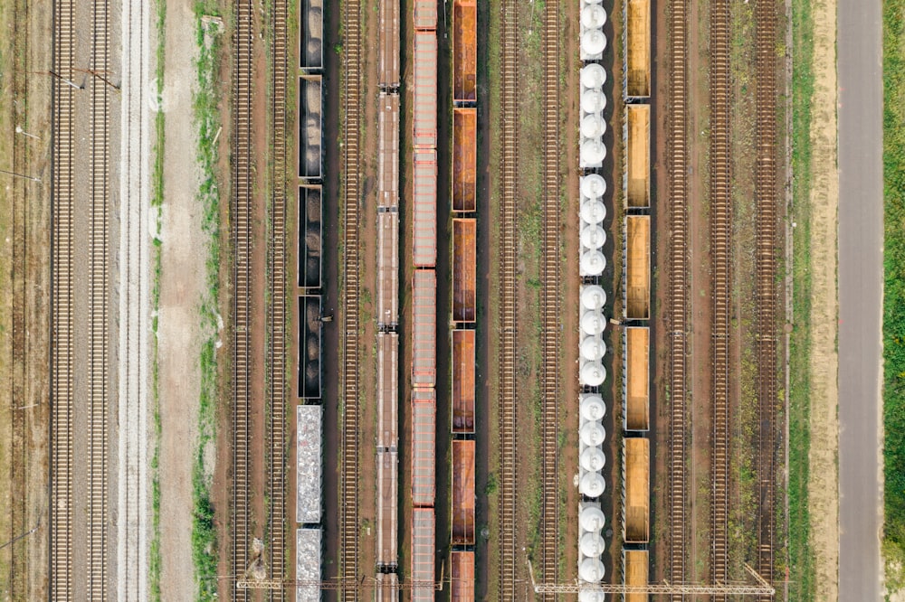 an aerial view of a train yard with several trains