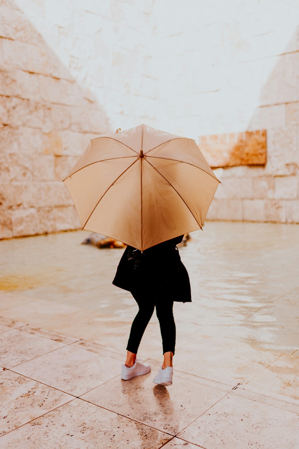 woman using umbrella