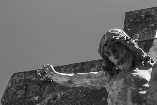 man hanged on cross