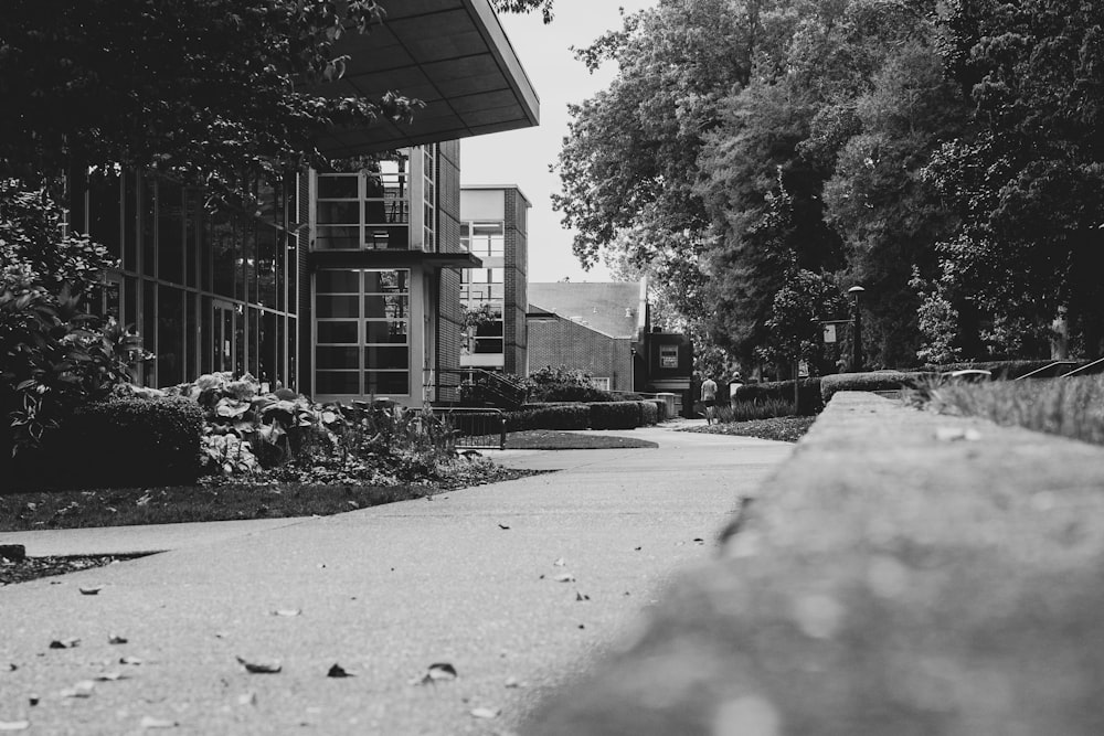 grayscale photo of white concrete house