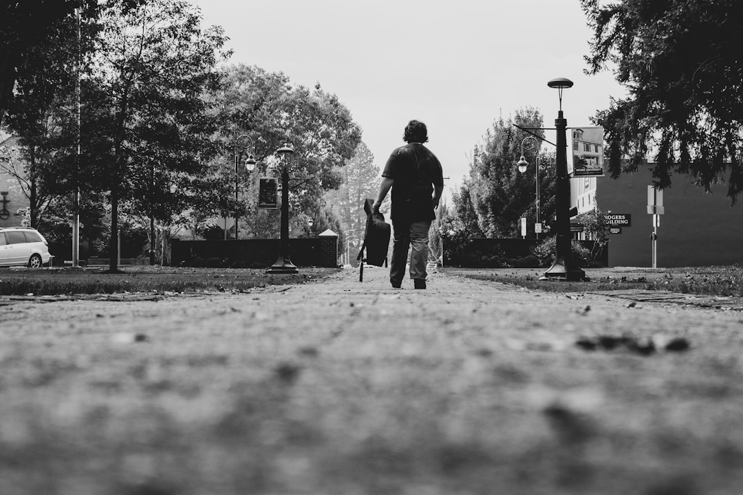 man with a bag walking