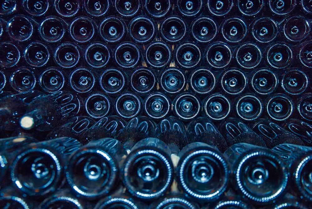 rows of black bottles