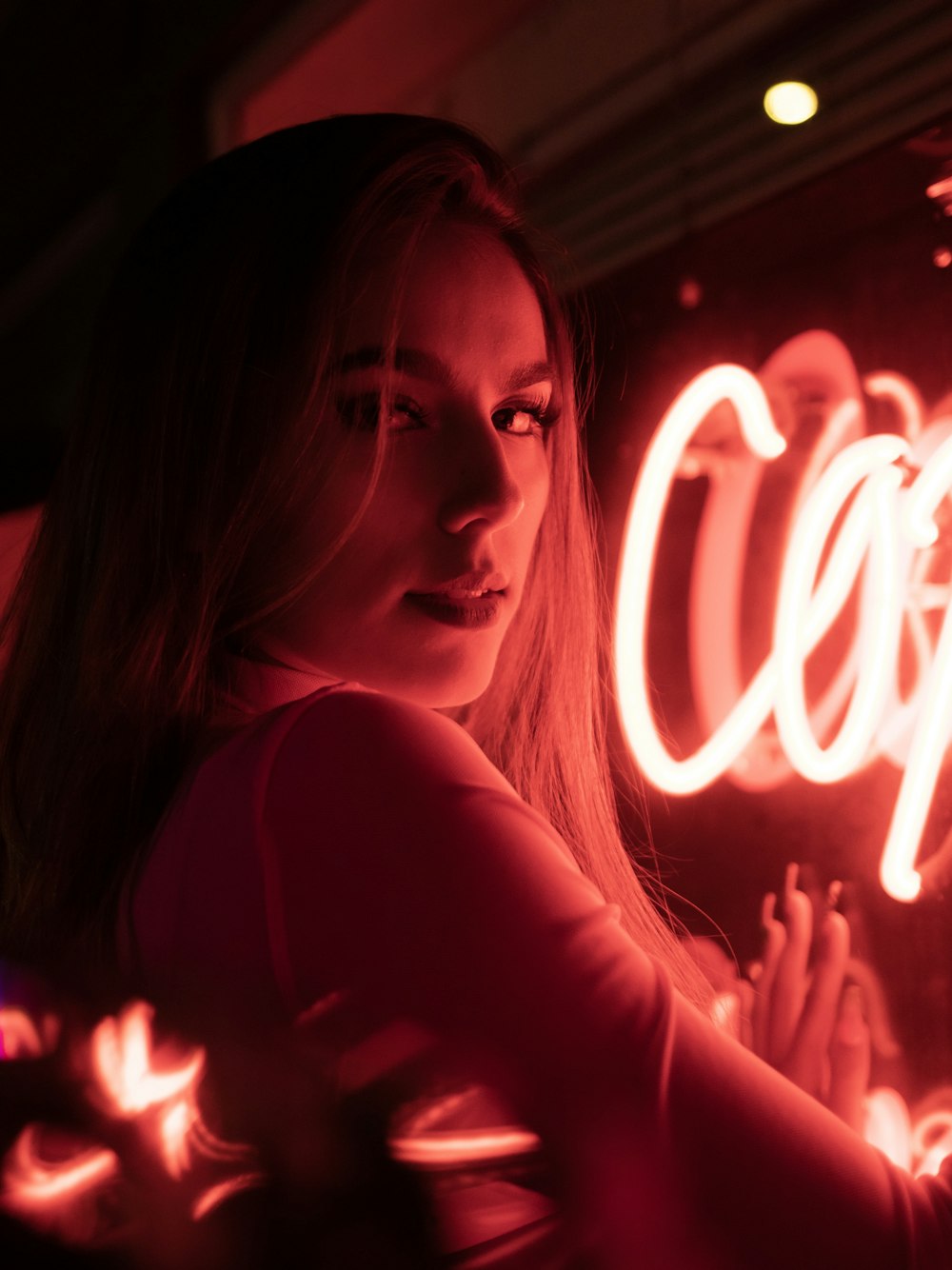 woman standing near signage